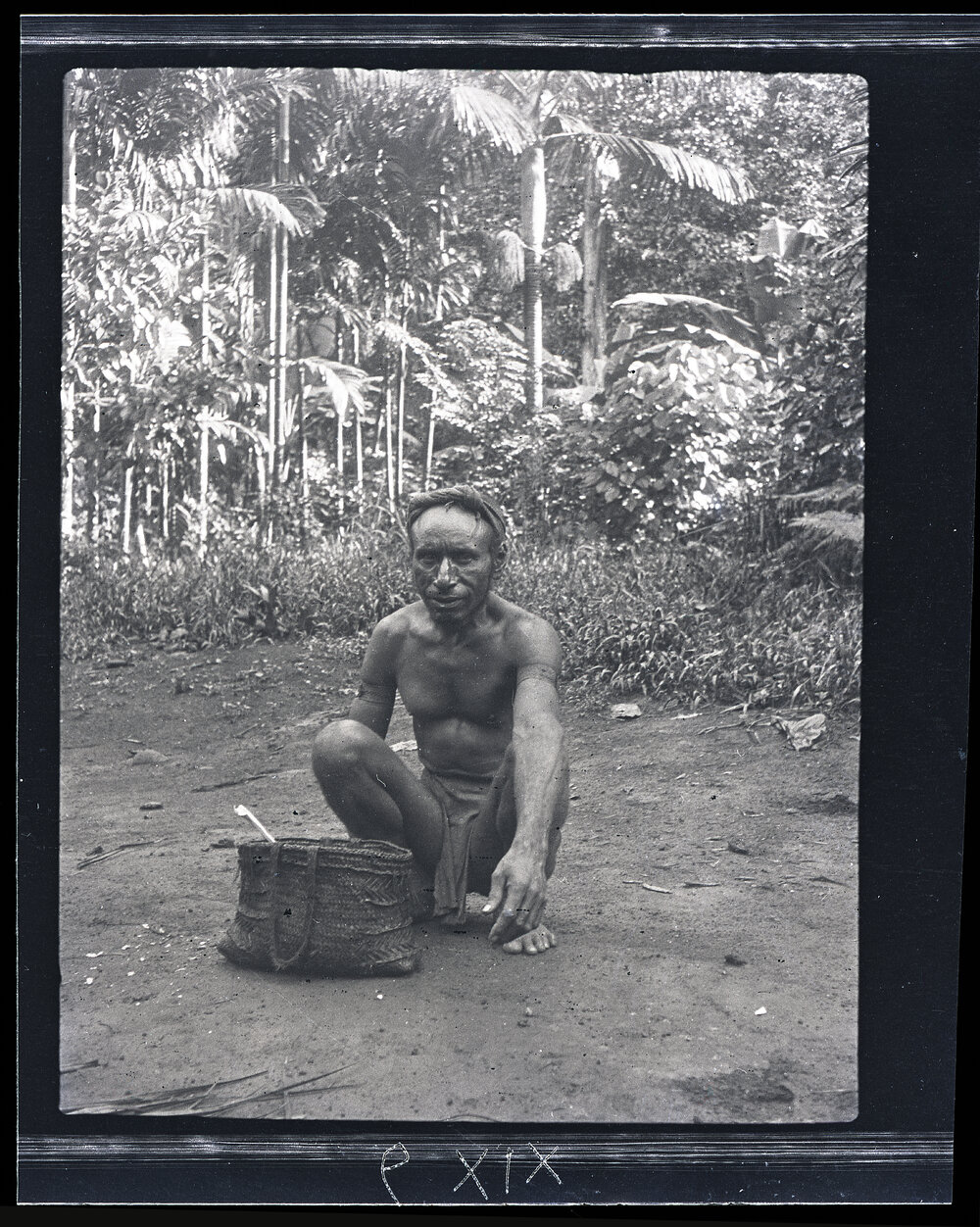 [Manum Island, New Guinea] Her Husband Sits and Looks on