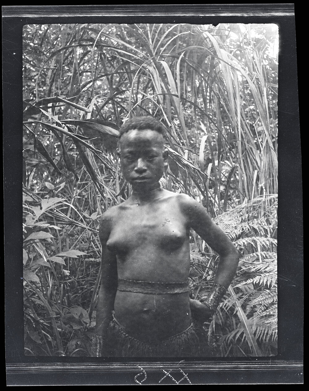 [Manum Island, New Guinea] A Girl of an Inland Homestead Just After Being Washed in the Bush During the Last of her First Menstruation Rites