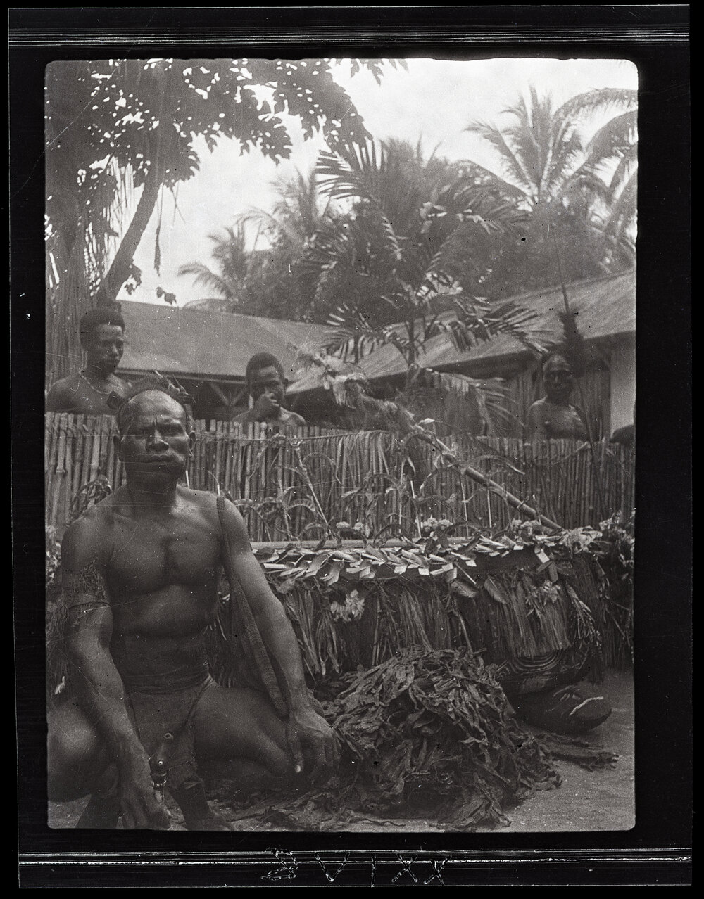 [Manum Island, New Guinea] Man of Awar with the New Gong Brought from Awar to the Plantation