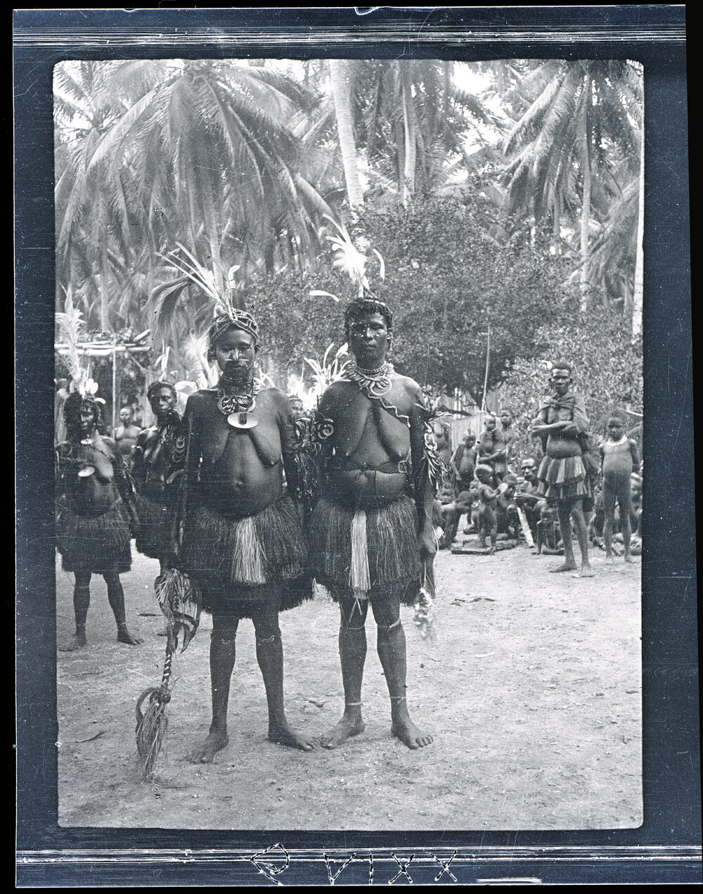 [Manum Island, New Guinea] Two Girls of Awar who led the Dancers in the Fish-Hawk Dance Celebrating the New Gong