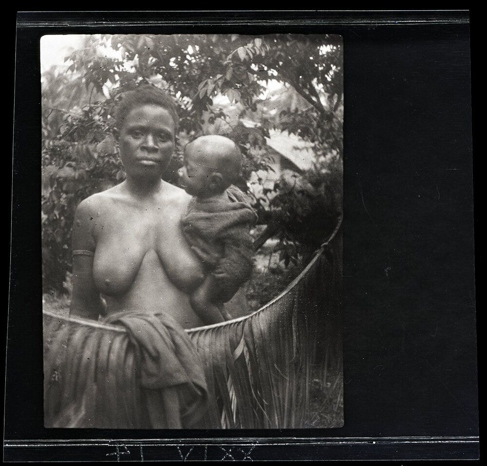 [Manum Island, New Guinea] A Woman of Nubia or Awar with her Baby