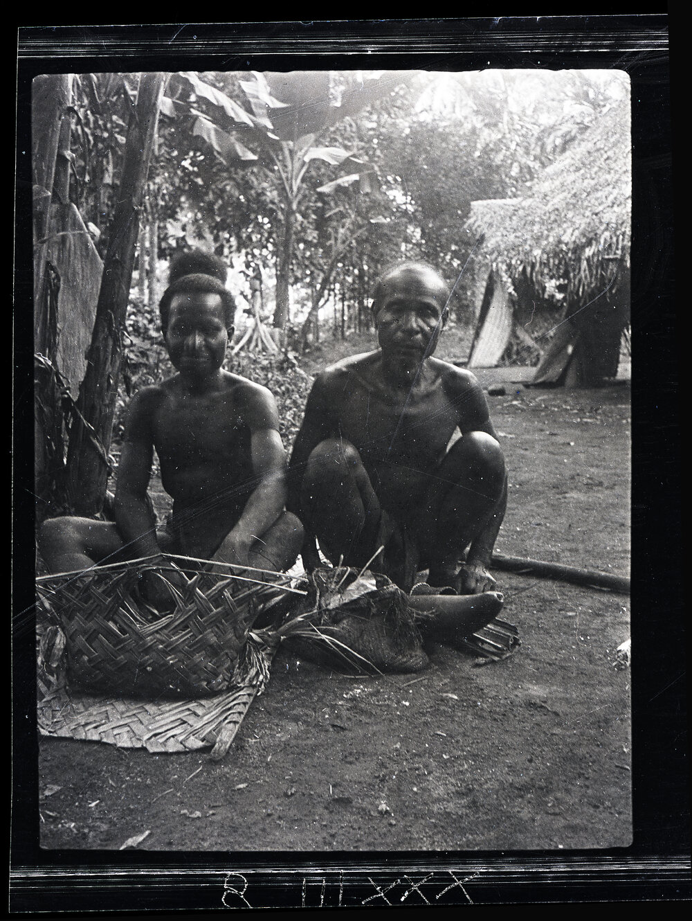 [Manum Island, New Guinea] Tsŋania of Mwanuyia and his Son Maguŋ