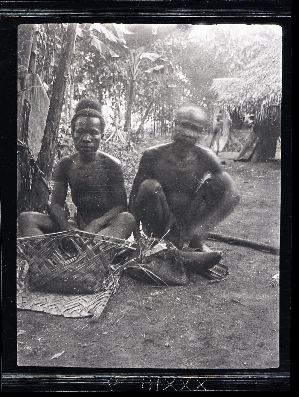 [Manum Island, New Guinea] Tsŋania of Mwanuyia and his Son Maguŋ