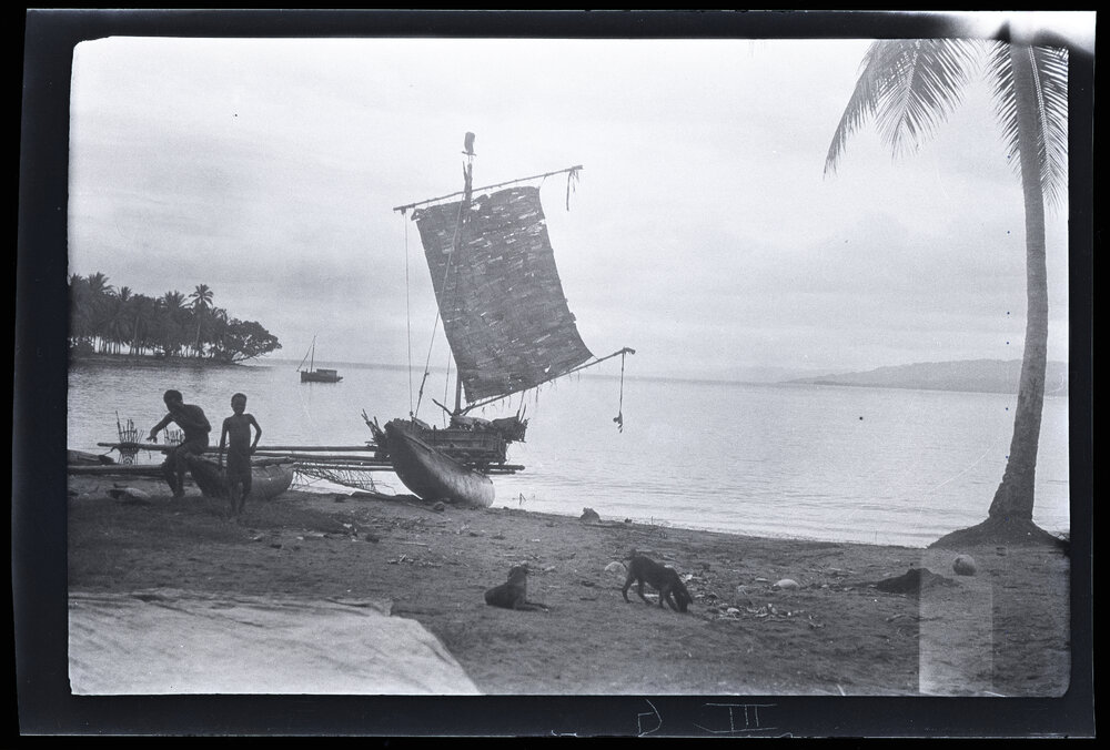 [Manum Island, New Guinea] A Manam Overseas Canoe on the Beach at Awar Plantation