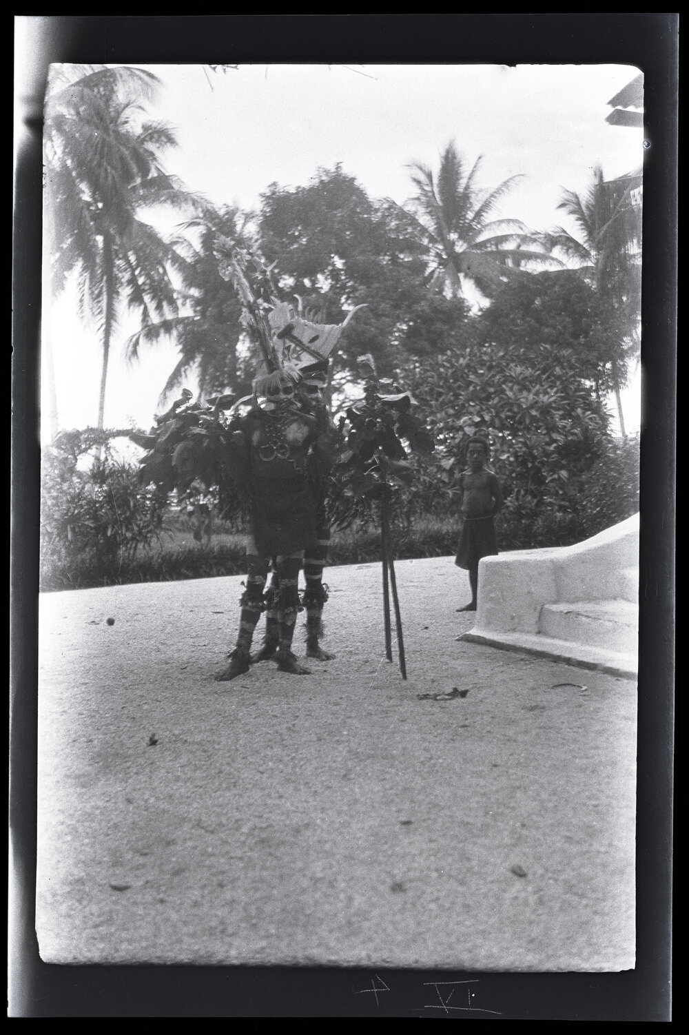 [Manum Island, New Guinea] Nubia Dances: the Leader and his Partner Slowly Approach the Main Body of the Dancers