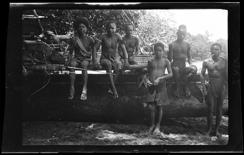 [Manum Island, New Guinea] The Same Group of People with Paisirua and Tsagera'a of Waia Sitting on the Punoŋ Canoe