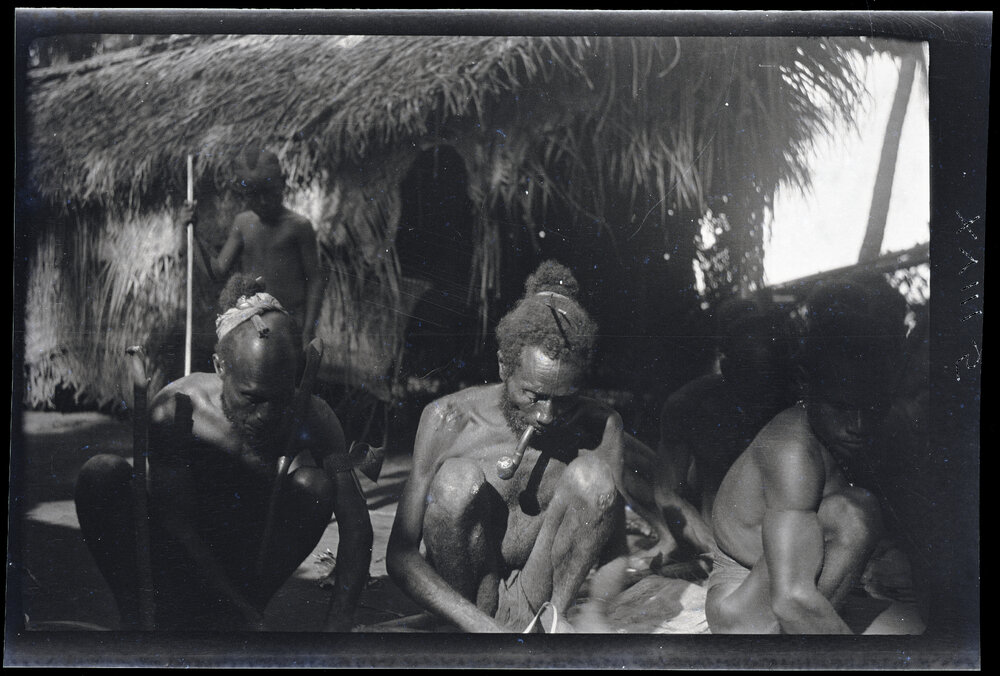 [Manum Island, New Guinea] Two Eelderly Men and &rsquo;Asu&rsquo;asu Sewing a Sail
