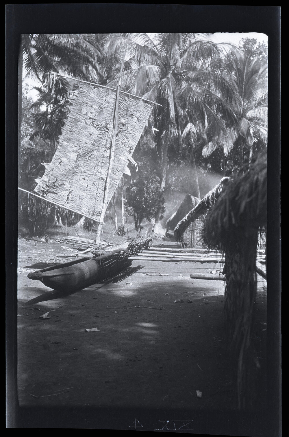 [Manum Island, New Guinea] The Sail of Mamboti&rsquo;s Canoe Finished and set up after the Dugulaba Men have Gone