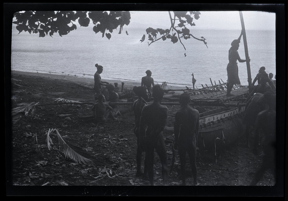 [Manum Island, New Guinea] Mamboti&rsquo;s Canoe. Raising the Mast