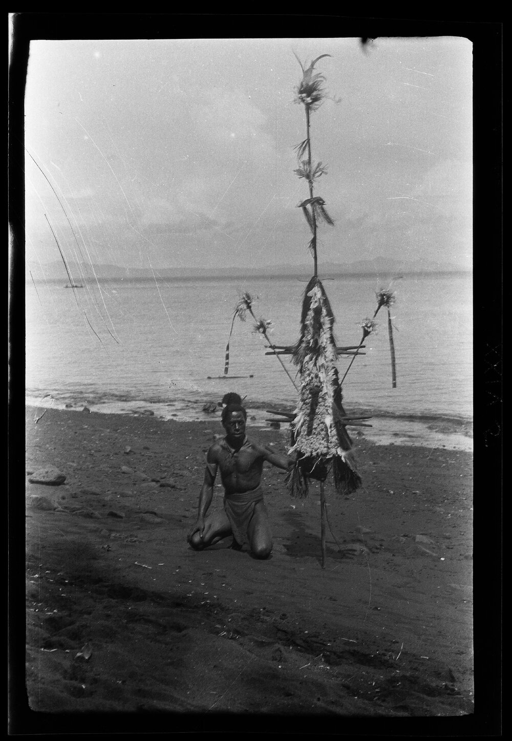 [Manum Island, New Guinea] Mamboti&rsquo;s canoe. The laŋolaŋo of Mamboti with A'un Beside it