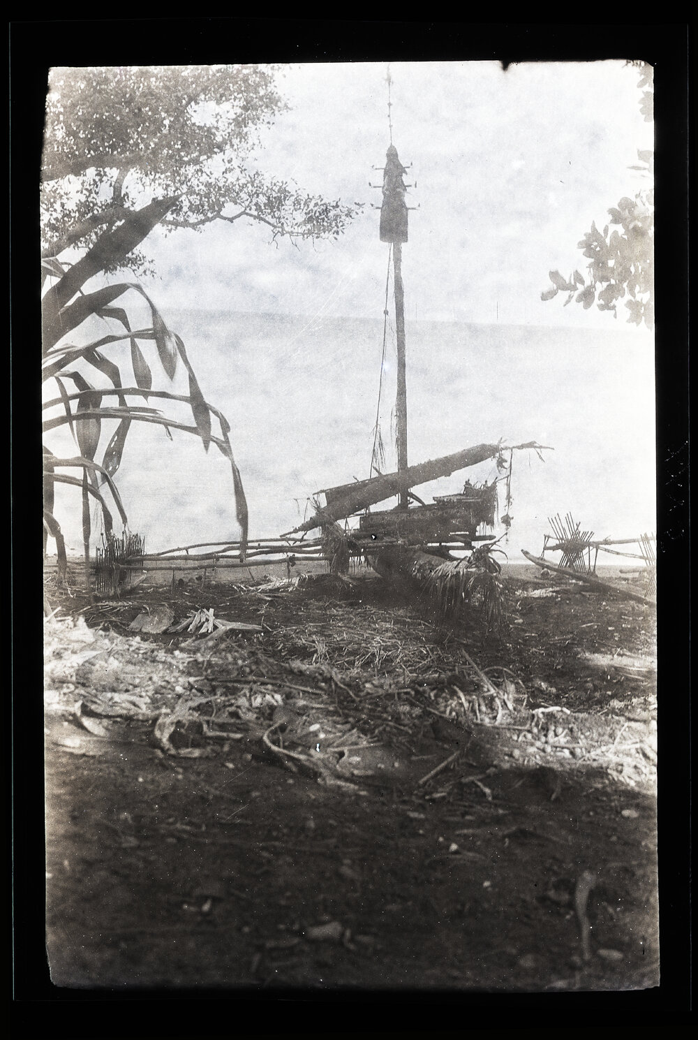[Manum Island, New Guinea] The New Waia Canoe Beached Below CHW's [Wedgwood] House at Dabwa
