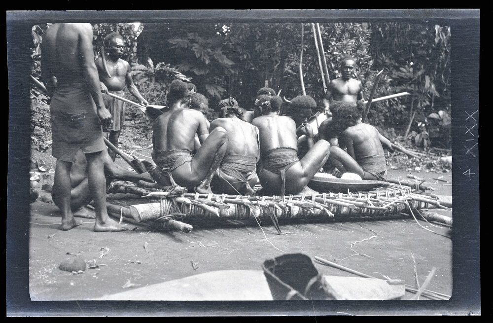 [Manum Island, New Guinea] Packing the tapa&rsquo;a into the Wild Banana Leaves