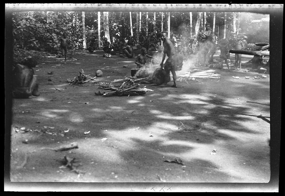 [Manum Island, New Guinea] Putting the Pots on to Boil for Cooking Pig