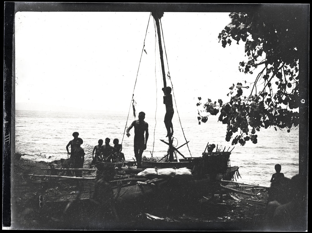 [Manum Island, New Guinea] Preparing for a Voyage. Small Boy Slips the Rope for Hoisting the Sail Over the Block
