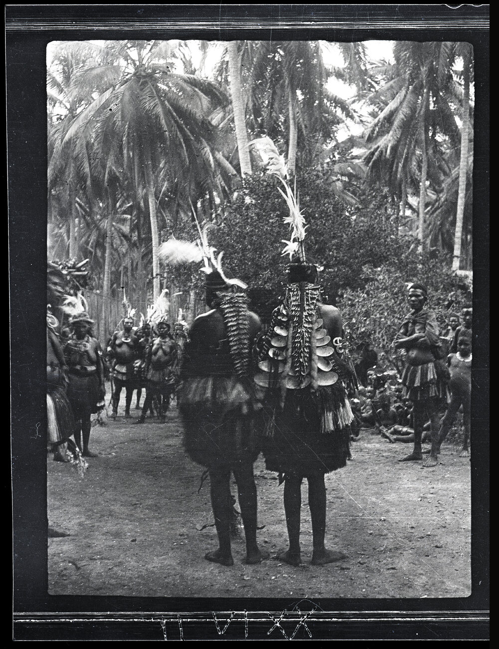 [Manum Island, New Guinea] The Back View of the Two Girl Dancers in Awar, Showing their Orna&shy;ments