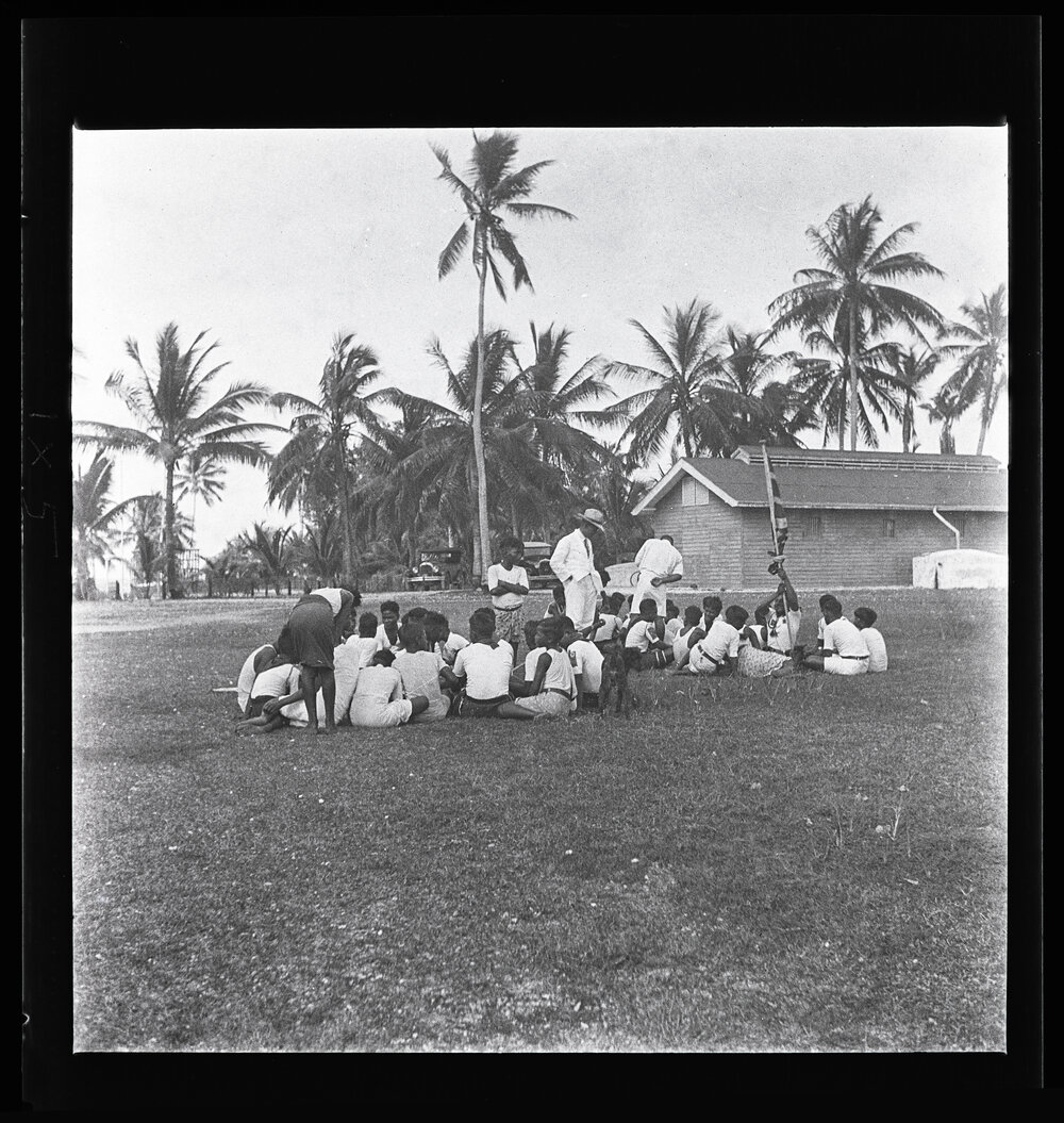 [Narau] The Scouts Yarning with their Friends after the Parade. The Man Standing up is Head-teacher Aroi