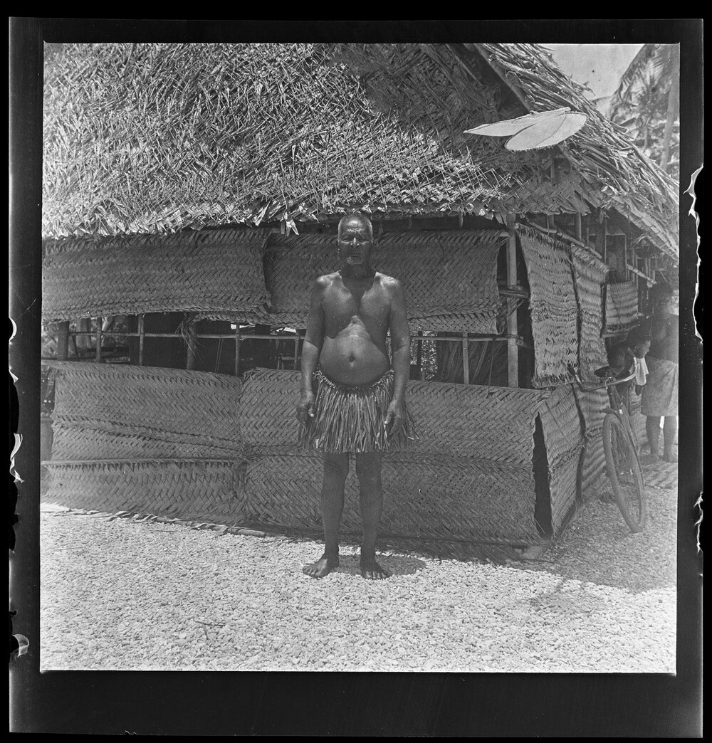 [Narau] Domawaije of Anetan Wearing a ridi Outside his House