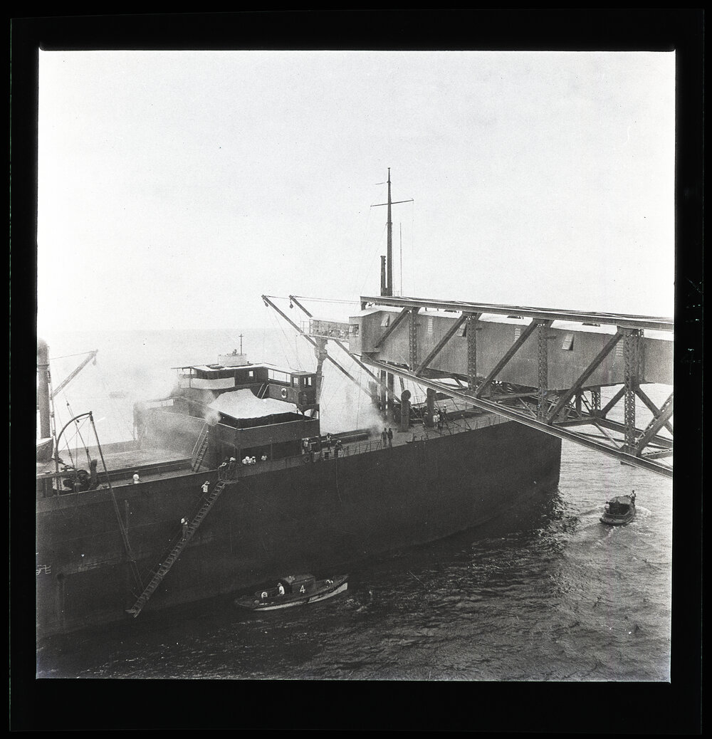 [Narau] Loading Phosphate into the Trentbank. The Right Arm of the Cantilever Loading the Forward Hold.