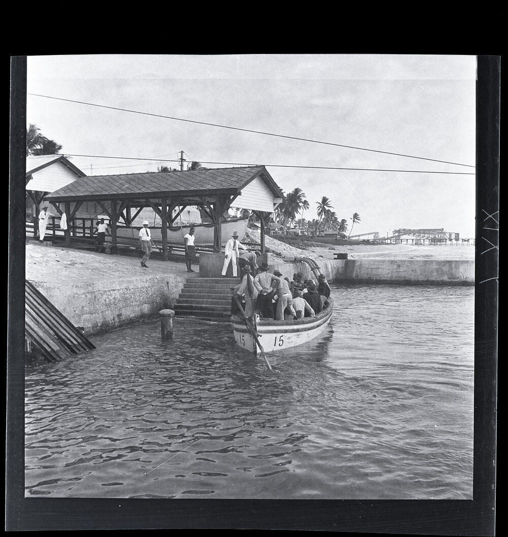 [Narau] A Boatload (circa 50) of Recruits Landing at the Boat Harbour