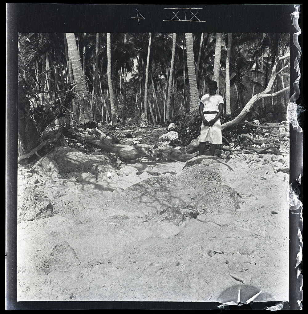 [Narau] The Stone Representation of Emenea in the Sand at the SW [Southwest] End of Anibari By [Bay]. Simon is Standing at the Head of the Figure