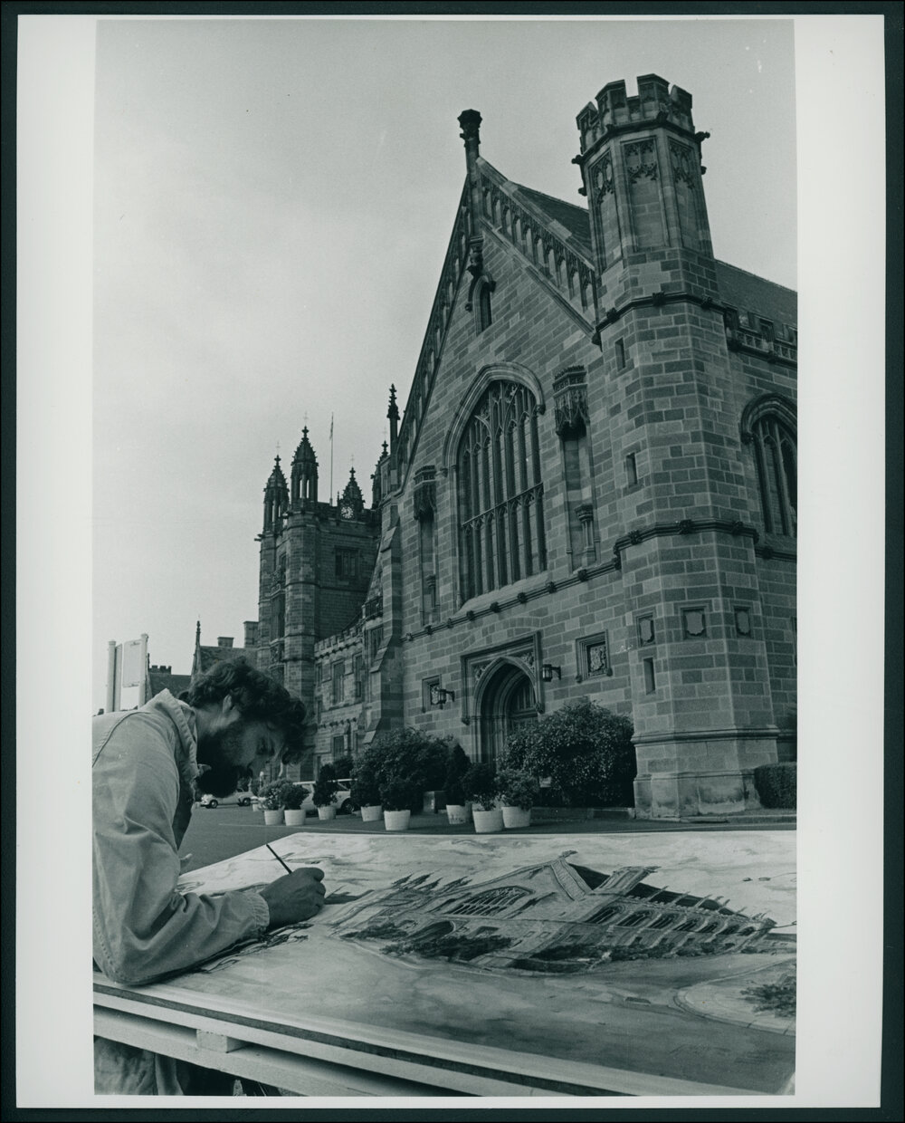 Artist Painting the Main Building