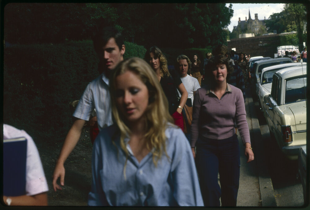 Students Walking on Western Avenue Near the Bosch Buildings
