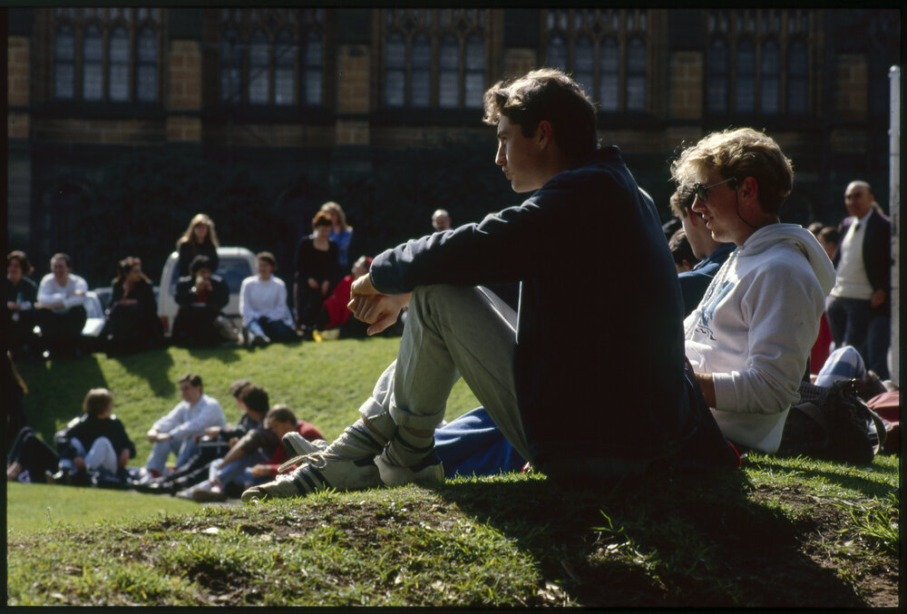 Students Relaxing on Grass