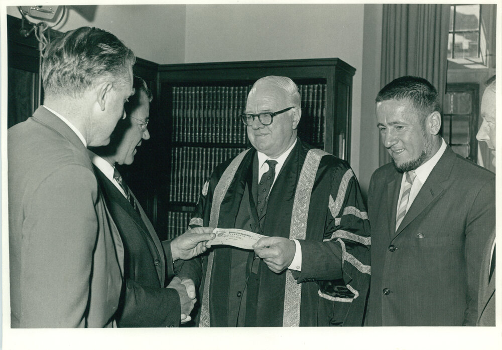 Presentation of Cheque by the US Consul-General, Mr Laurence C Vass to Assist in the Construction of Mills Cross Radio Telescope