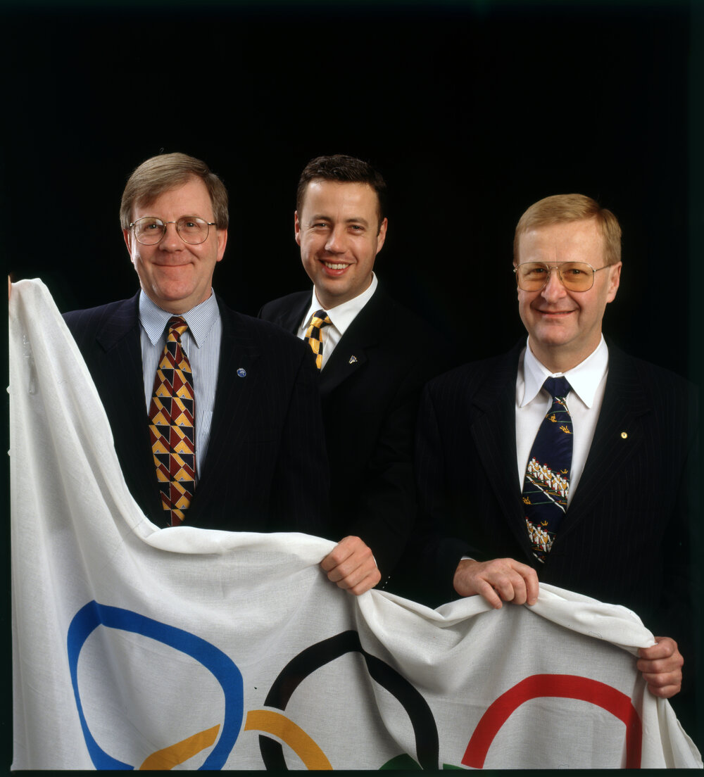 Sandy Hollway, Craig Hassall, Jane Spring and John Coates with Olympic Flag