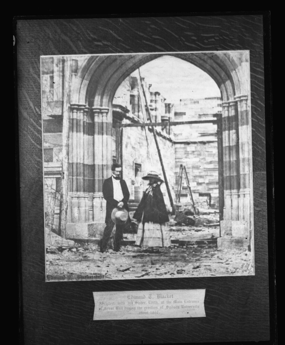 University Architect Edmund Thomas Blacket and Daughter Edith Outside the Great Hall during Construction - Enlargement