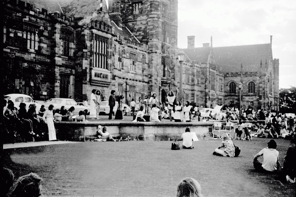 Students Performing a Play in Front of the Main Building