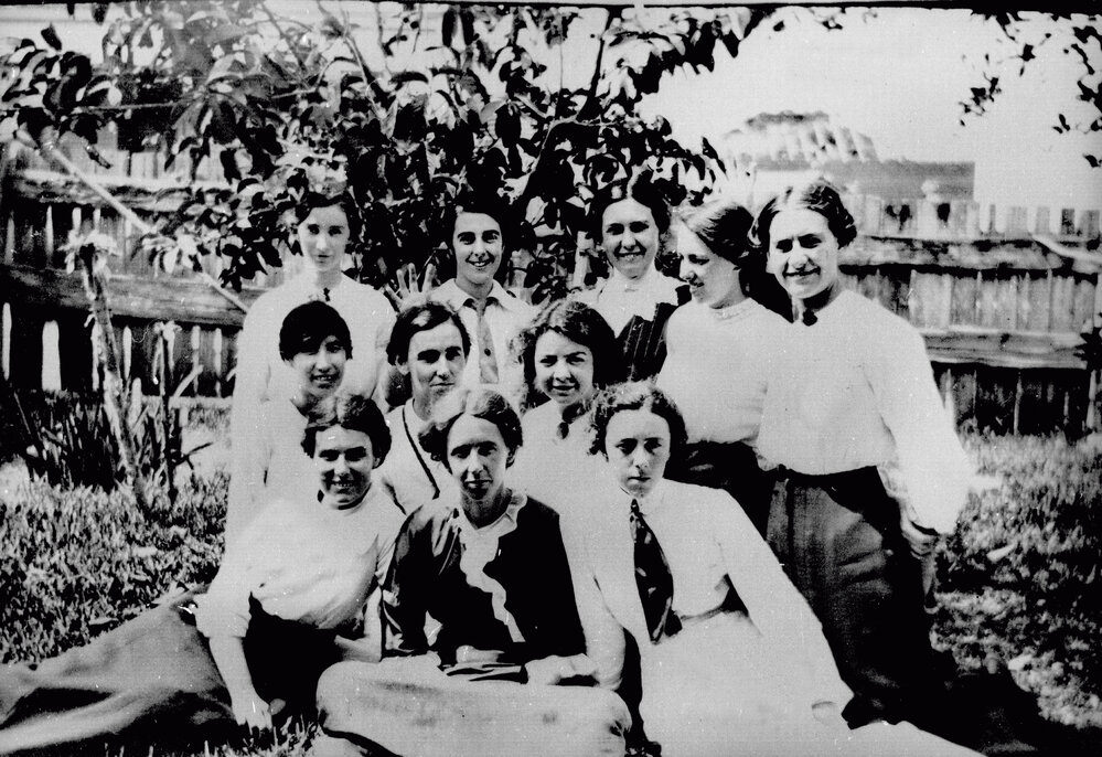 Women Science Students Seated in a Garden