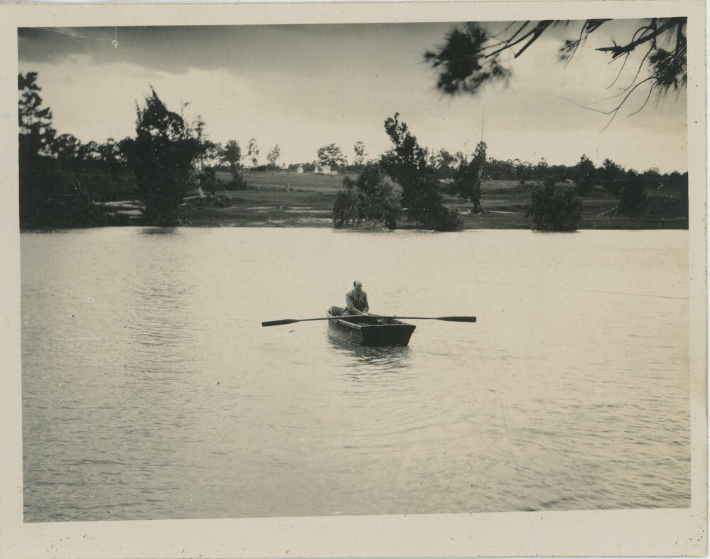 Mr Hindmarsh Rowing Across the River in the Dinghy