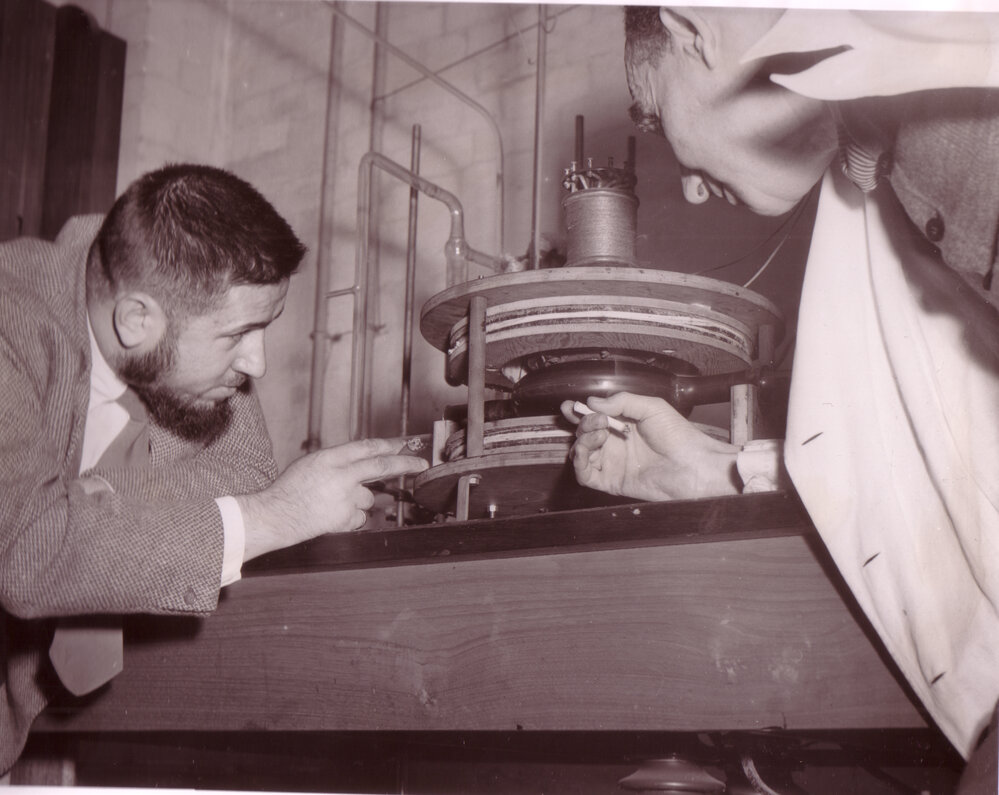Professor Harry Messel and Dr Landecker Examining Equipment in Kurt's Lab