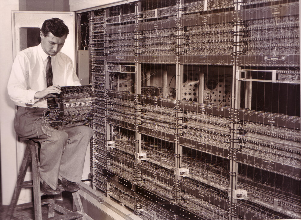 Peter Aplin During the Early Stages of the Construction of SILLIAC