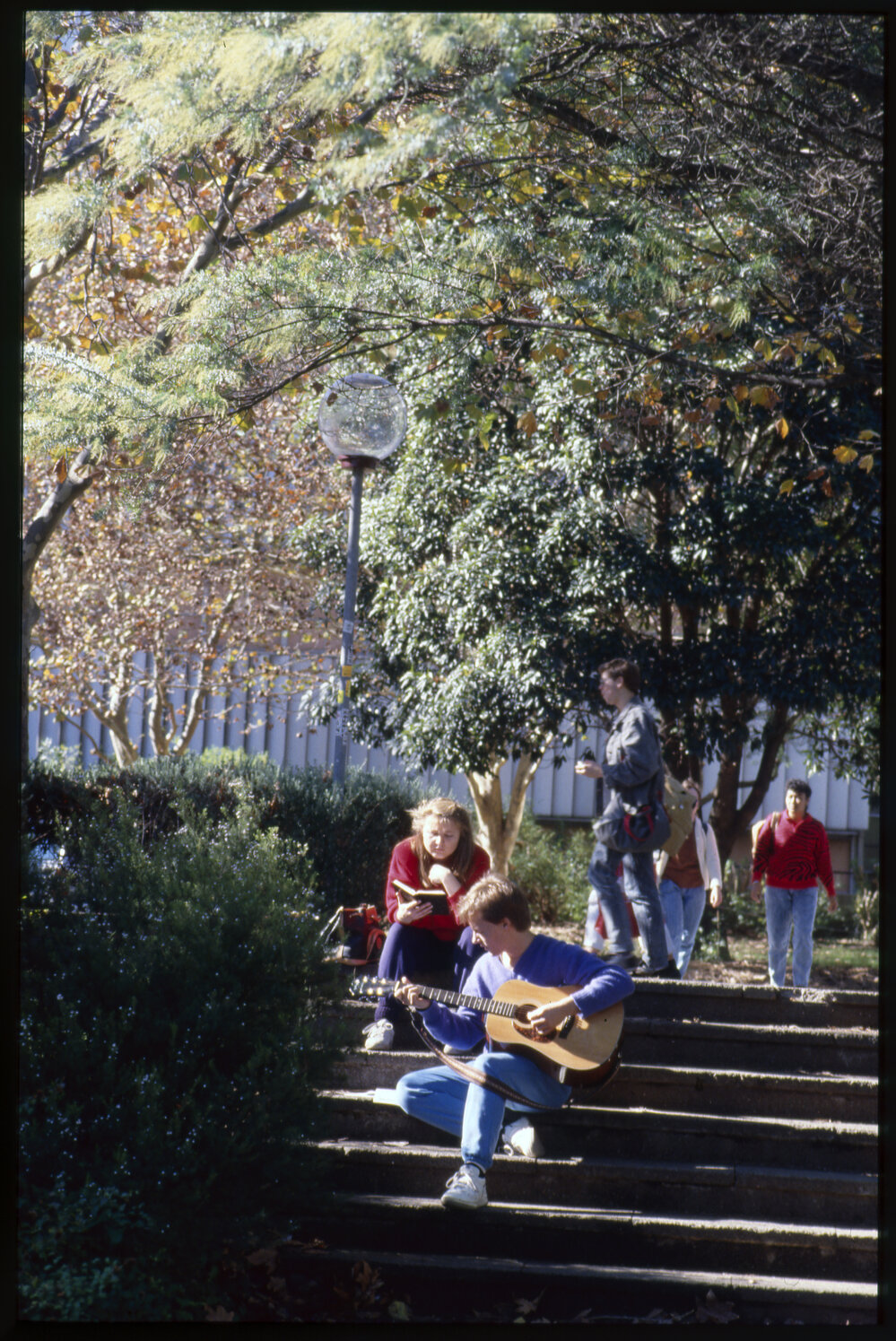 Students Relaxing on Stairs