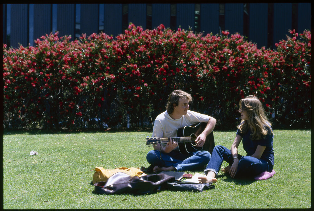 Students Relaxing on Lawn