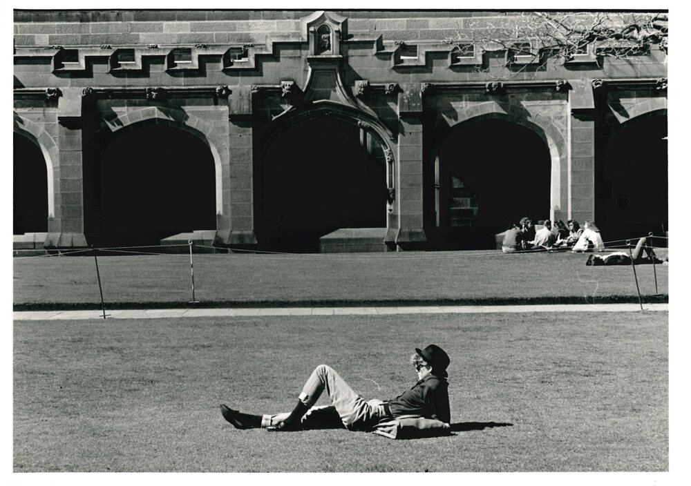 Student Relaxing on the Quadrangle Lawn