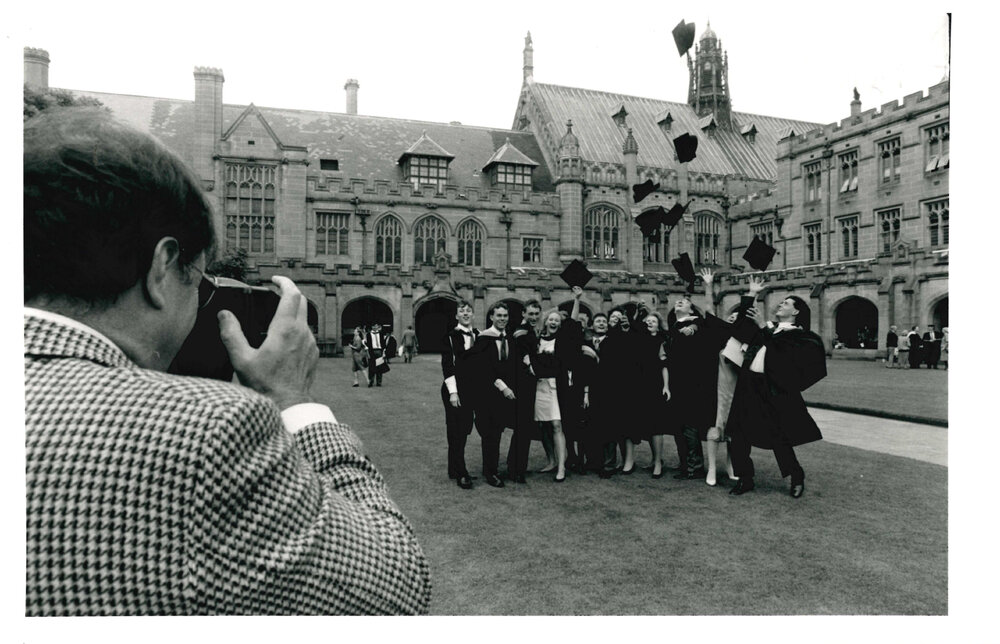 Graduates Posing for a Photographer in the Quadrangle