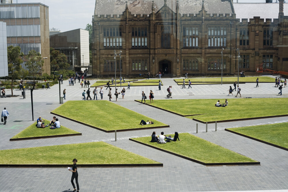 Students on Eastern Avenue and the New Law Building Lawns