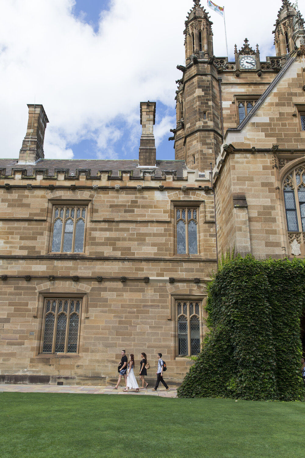 Students in Quadrangle with a View of the Clocktower 