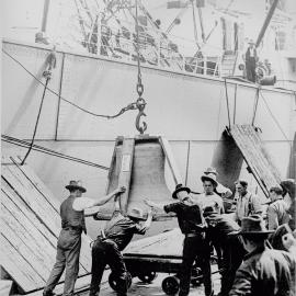 Unloading the University War Memorial Carillon Bells from Ship for Transport the University 