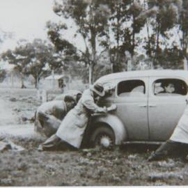 Bob Mitten, John Chalmers, Henry Byron and Ken Ferguson Pushing a Car, 2nd Year of Veterinary School, Wagga Wagga