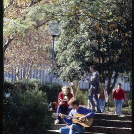 Students Relaxing on Stairs