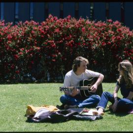 Students Relaxing on Lawn