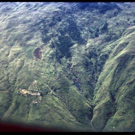 Aerial View of Mountain and Village