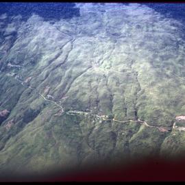 Aerial View of Mountain and Village