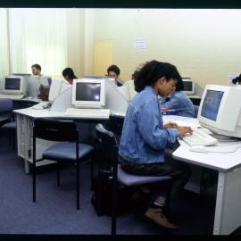 Nursing (?) Students Sitting at Terminals in Laboratory