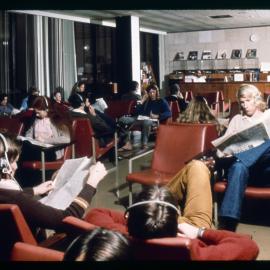 Students in Music Listening Area of Fisher Library
