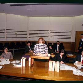 Law Students in Moot Court (?)